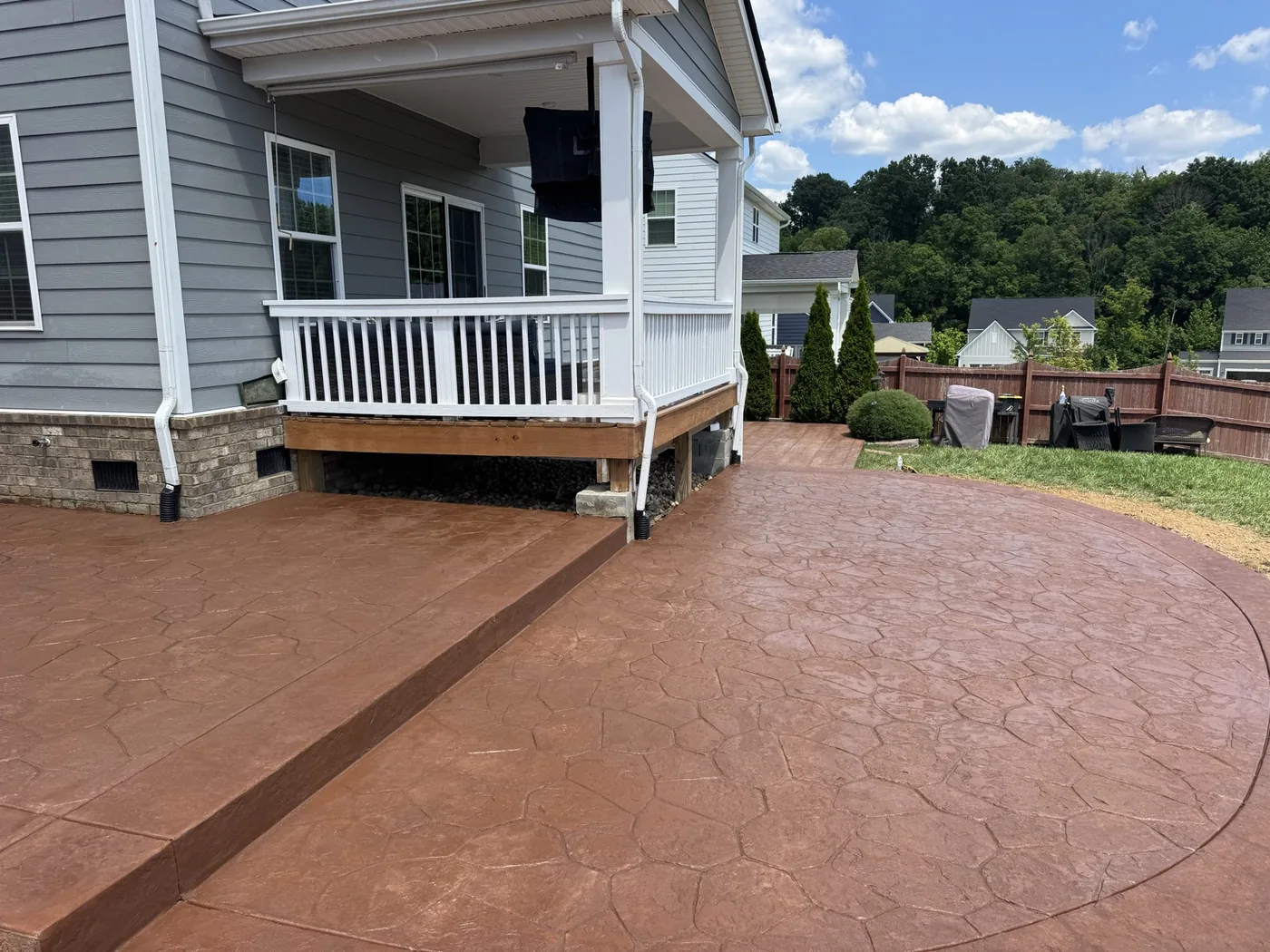 Fieldstone stamped patio in sienna by Pumas Concrete, Mount Juliet TN