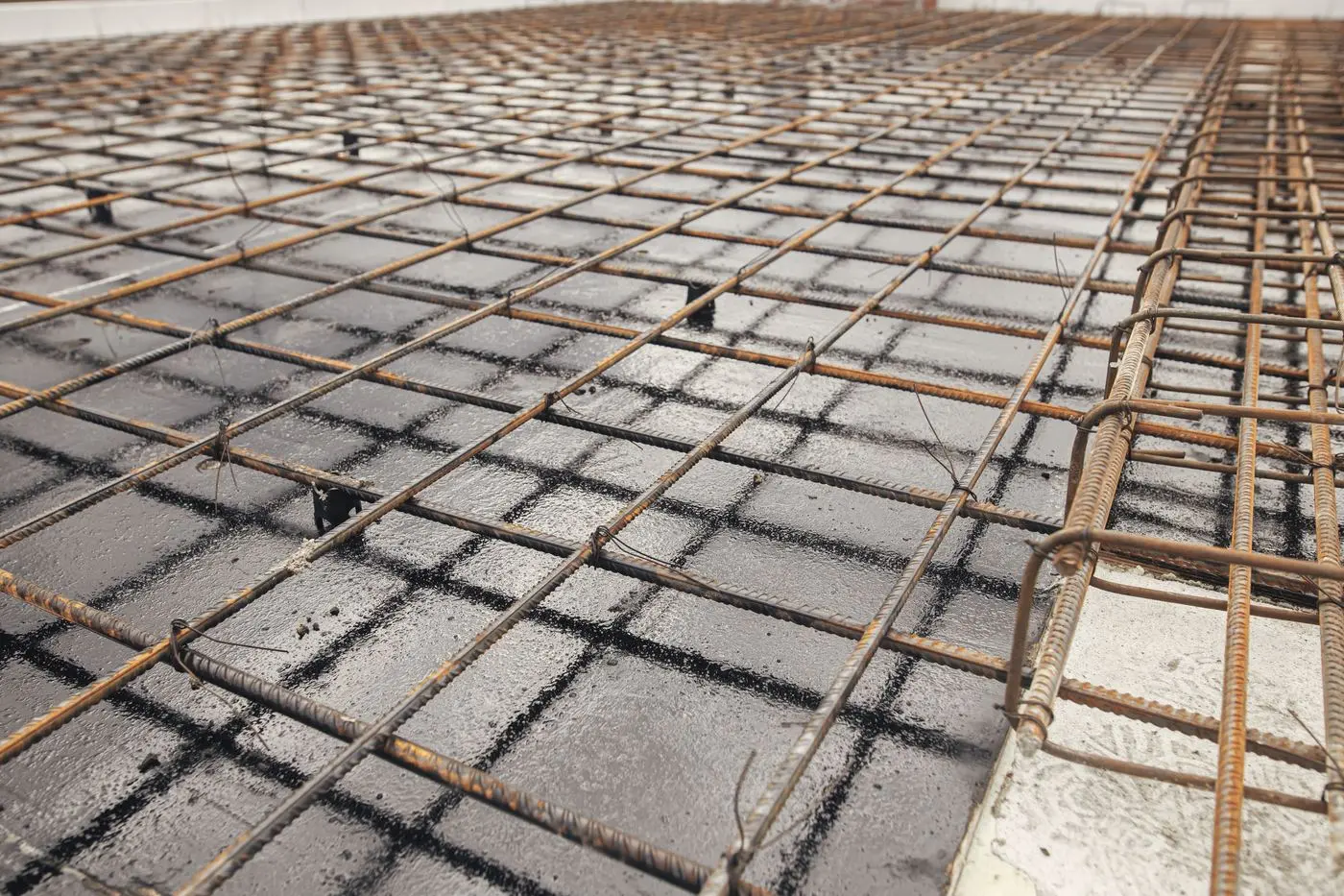 Rebar grid on chair rails before an engineered concrete pour